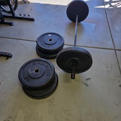 Olympic Bar, Collars, And 6 X 45LB bumpers