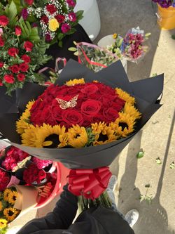 Sunflowers And Roses 