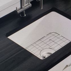 Oslo  24 inch under mount single bowl white ceramic kitchen sink with bottom grid and basket strainer