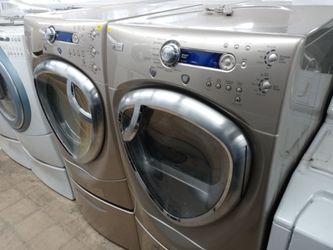 GE Profile tan front load washer and dryer set on pedestals - Free delivery