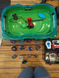 Used Multiseries Beyblade Arena with Beyblades, Launchers, and Spare Parts