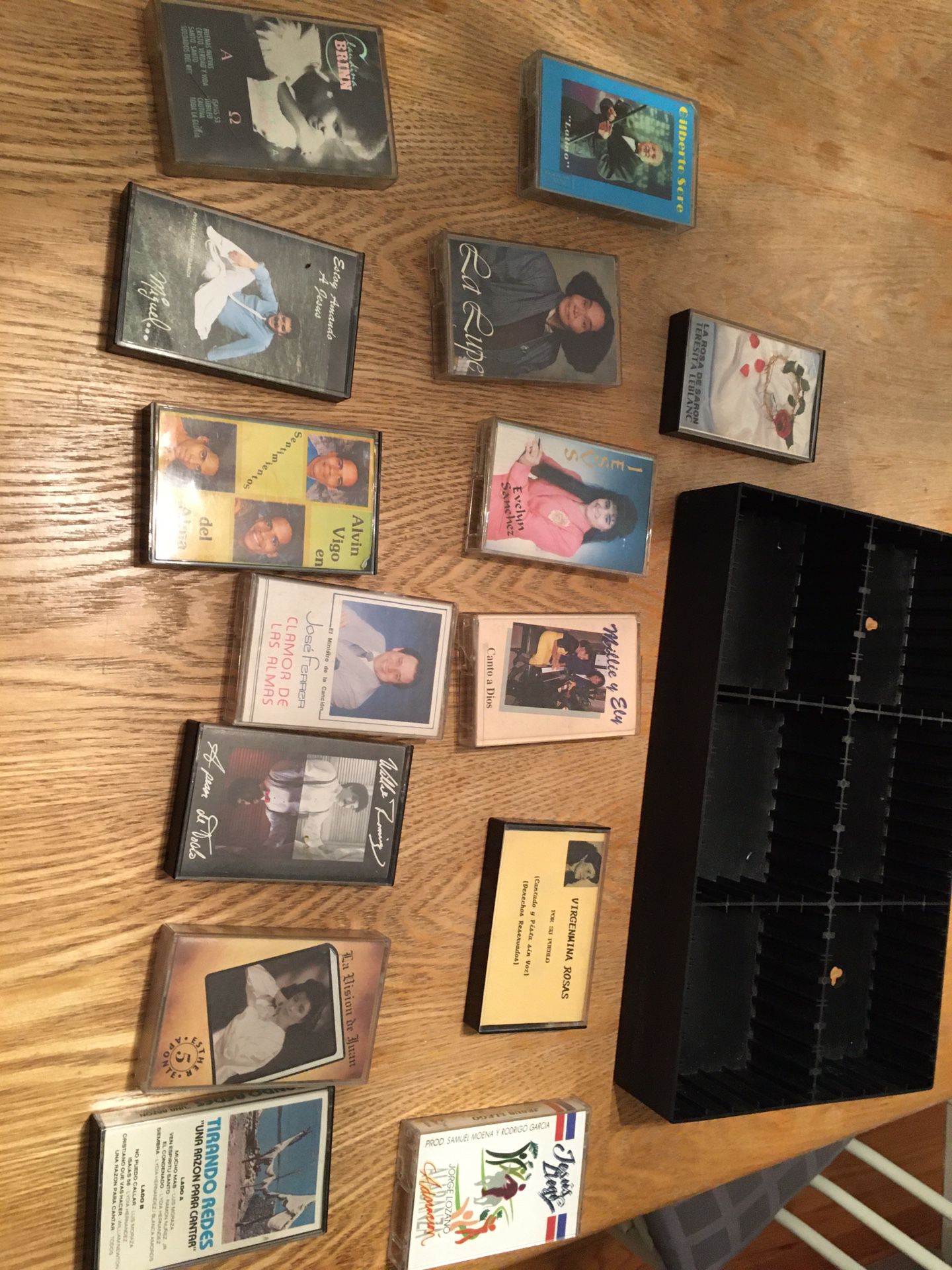 Collection of Spanish music tapes and organizer