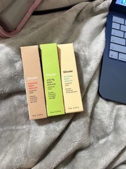 Glossier. Lip balms