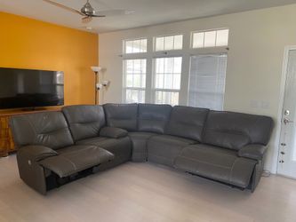 Gray leather (5) seat power reclining sectional couch