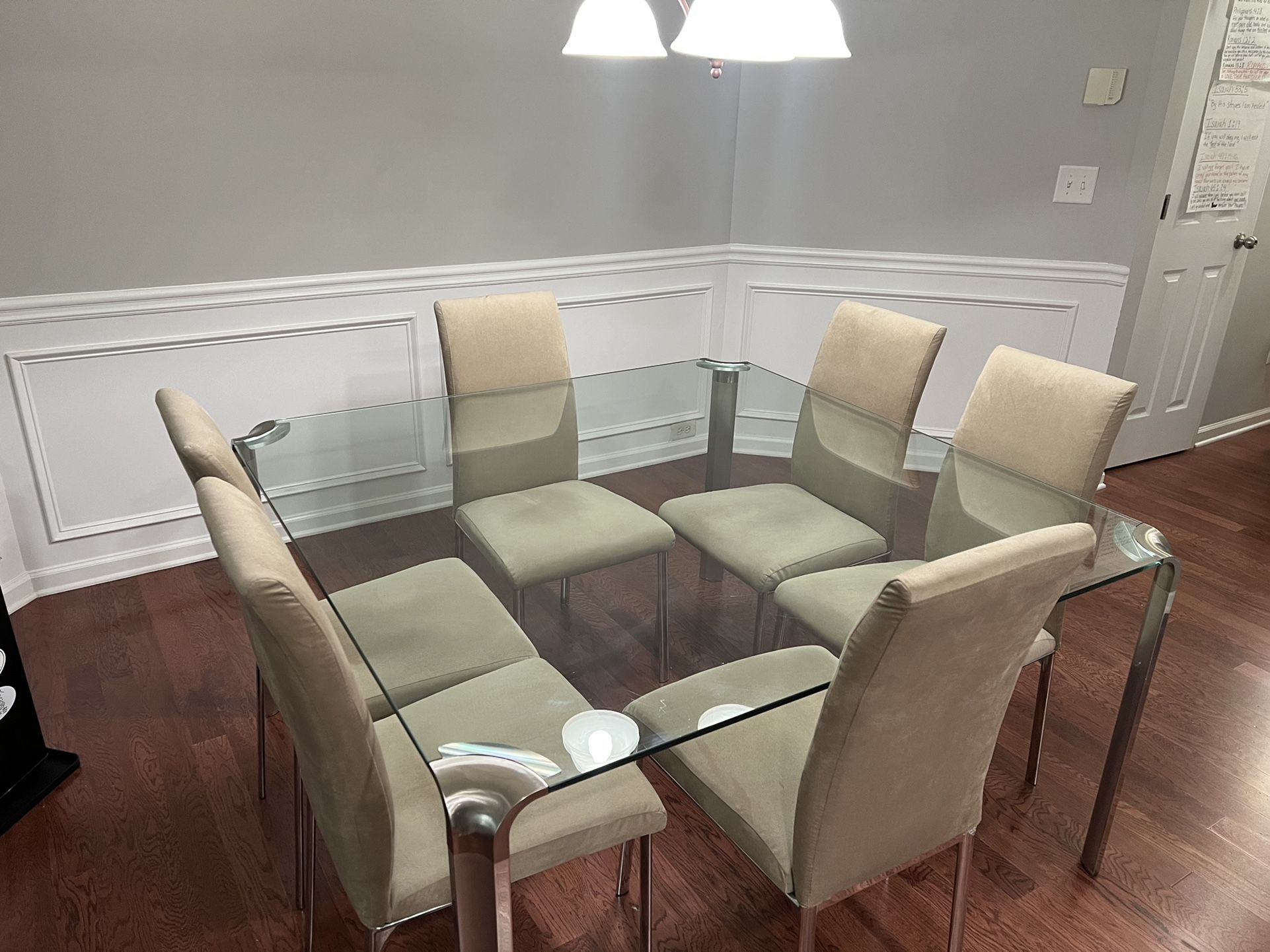 Glass dining room table with chairs 