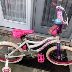 Like new of NEXT 18" girl's bike with training wheels.