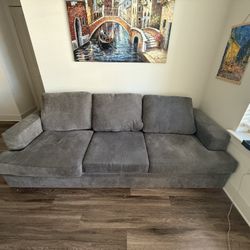 Gray Living Spaces Couch