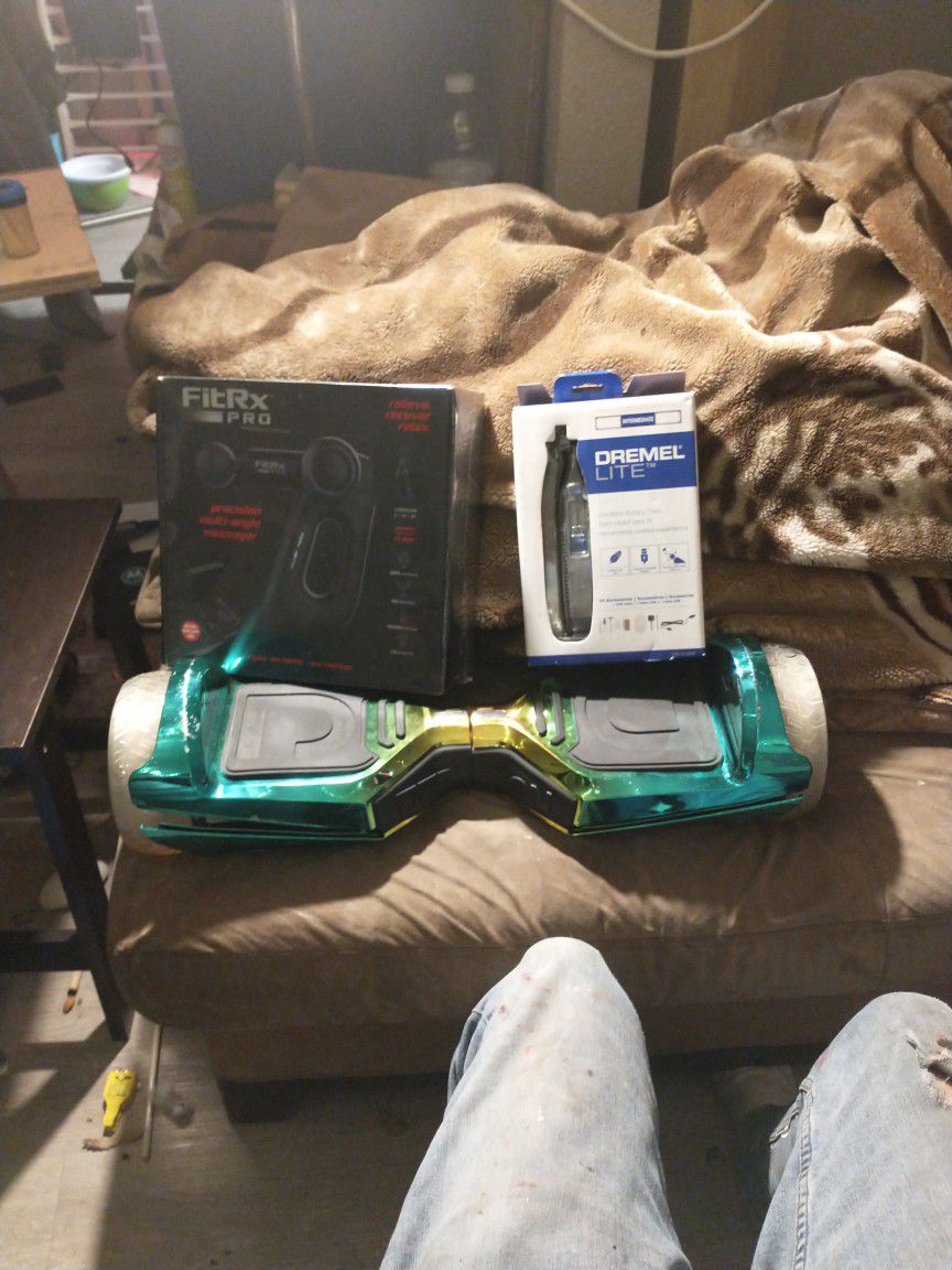  TRADE TRADE FitRx Massager,Brand New, Dremel Lite,Brand New And Jetson Rave Hoverboard w/Bluetooth $100 Or Trade For Guitar