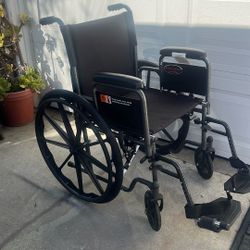 Large Wheel Chair With Feet Holds  300 Lbs