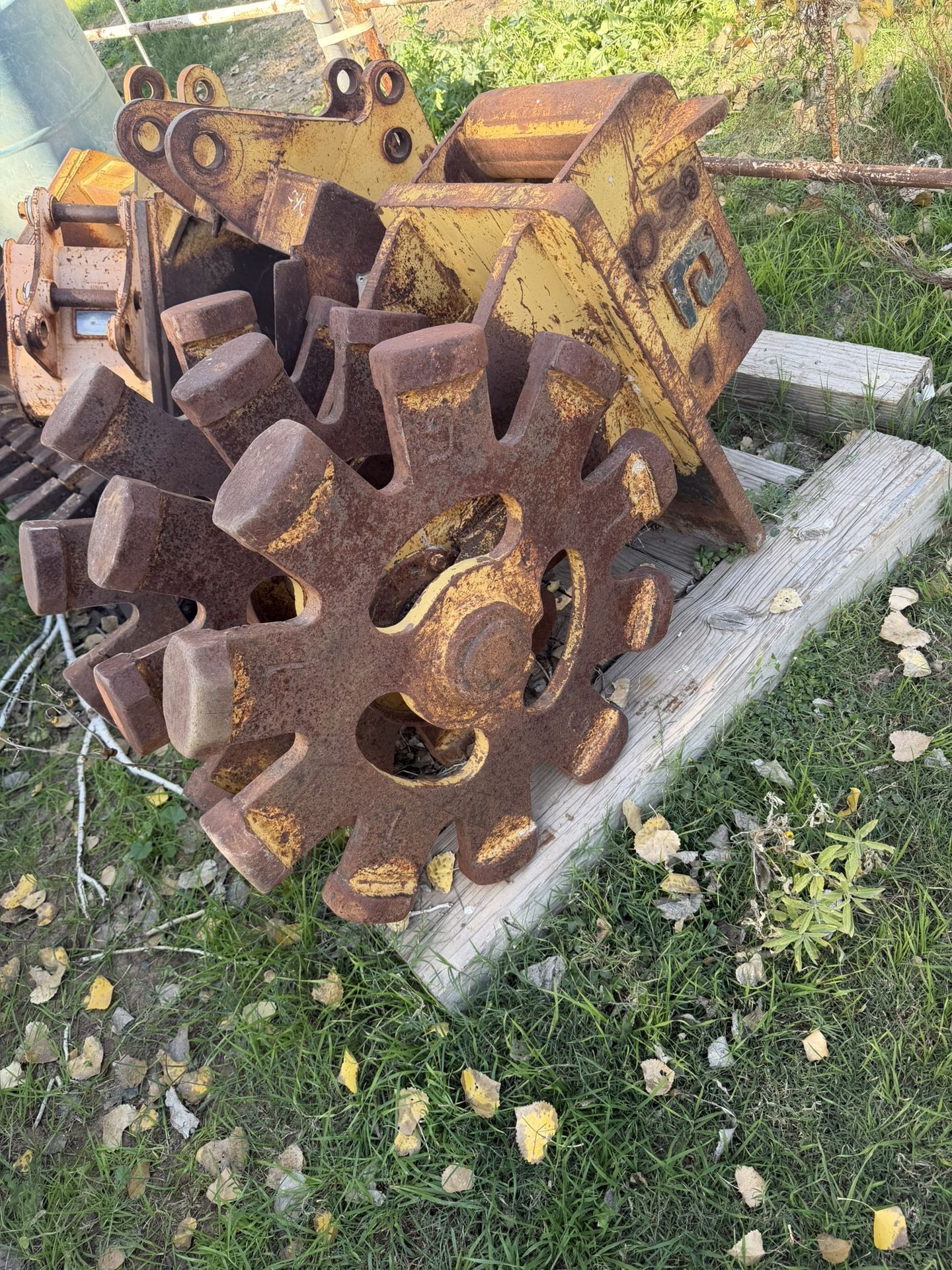 Backhoe Buckets And A Compaction Wheele