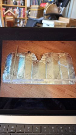 Large silver reflective car sunshade