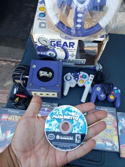 $160! 2 controller & 1 Game. $30! Per Game. $20 mic. & $80! Racing wheel.  Total $410! Do the math. I want $300! The lowest. Nintendo GameCube Console