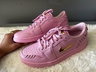 Pink and gold Nike air Jordan’s