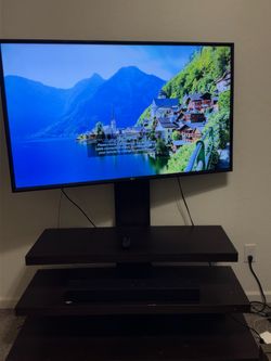 50 inch LG smart tv with stand & sound bar