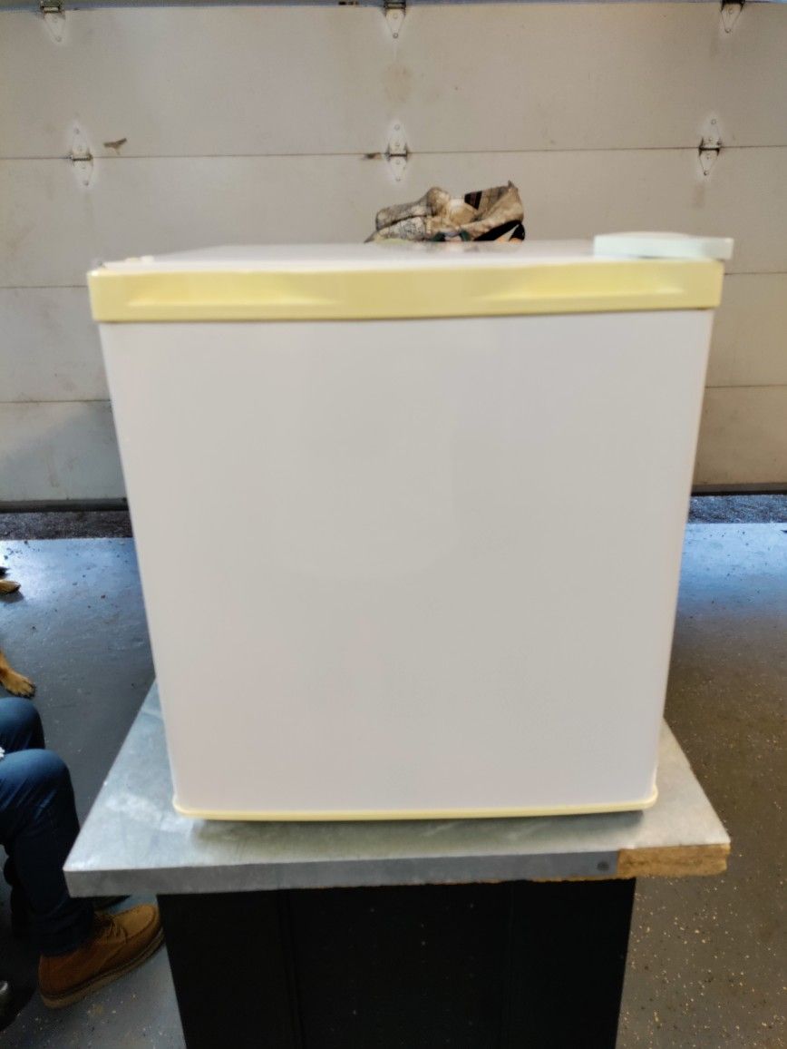 white mini fridge