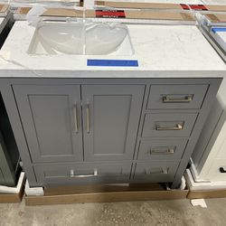 36” Bathroom Vanity in grey , single sink soft close solid wood with vanity top in white  $599  Luke’s liquidations warehouse Address:  2434 N Forsyth