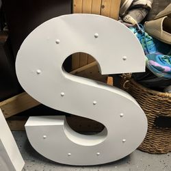 Large Marquee letters A and S