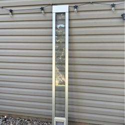 Dog door for sliding glass door