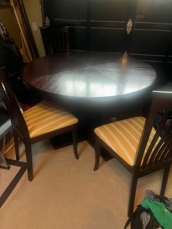 Crate and Barrel 48 inch round table with 24 inch insert