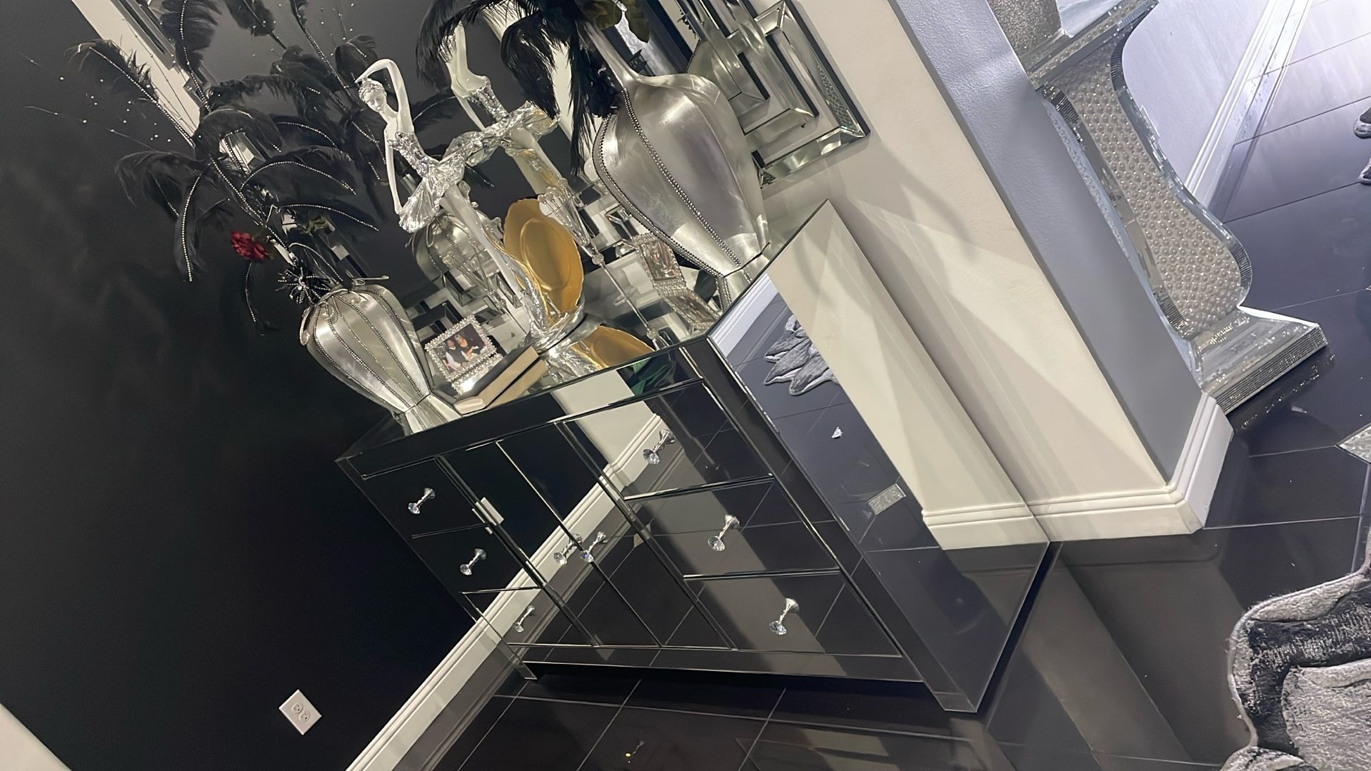 Wall mirror buffet or dresser curio cabinet with crystal knobs no cracks no scratches hardly used with ornaments on it sold