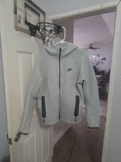 Large Gray Nike tech.