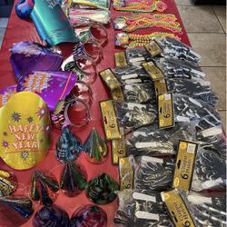New year accessories in bulk. 82 clapper hands, 36 or more mix new years hats , 16 Neon bead necklaces , 12 Foil Horns , and extra new year hats. It’s