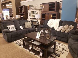 Power reclining sofa and love seat