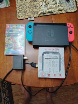 Nintendo switch V-1 unpatched, used console new controllers