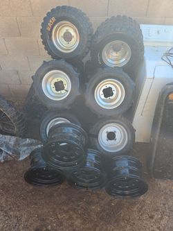 10 four wheeler rims six Chrome four black