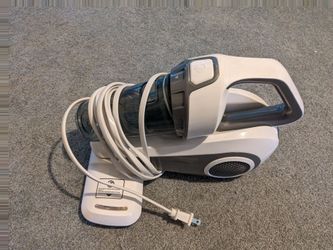 Small vacuum with UV