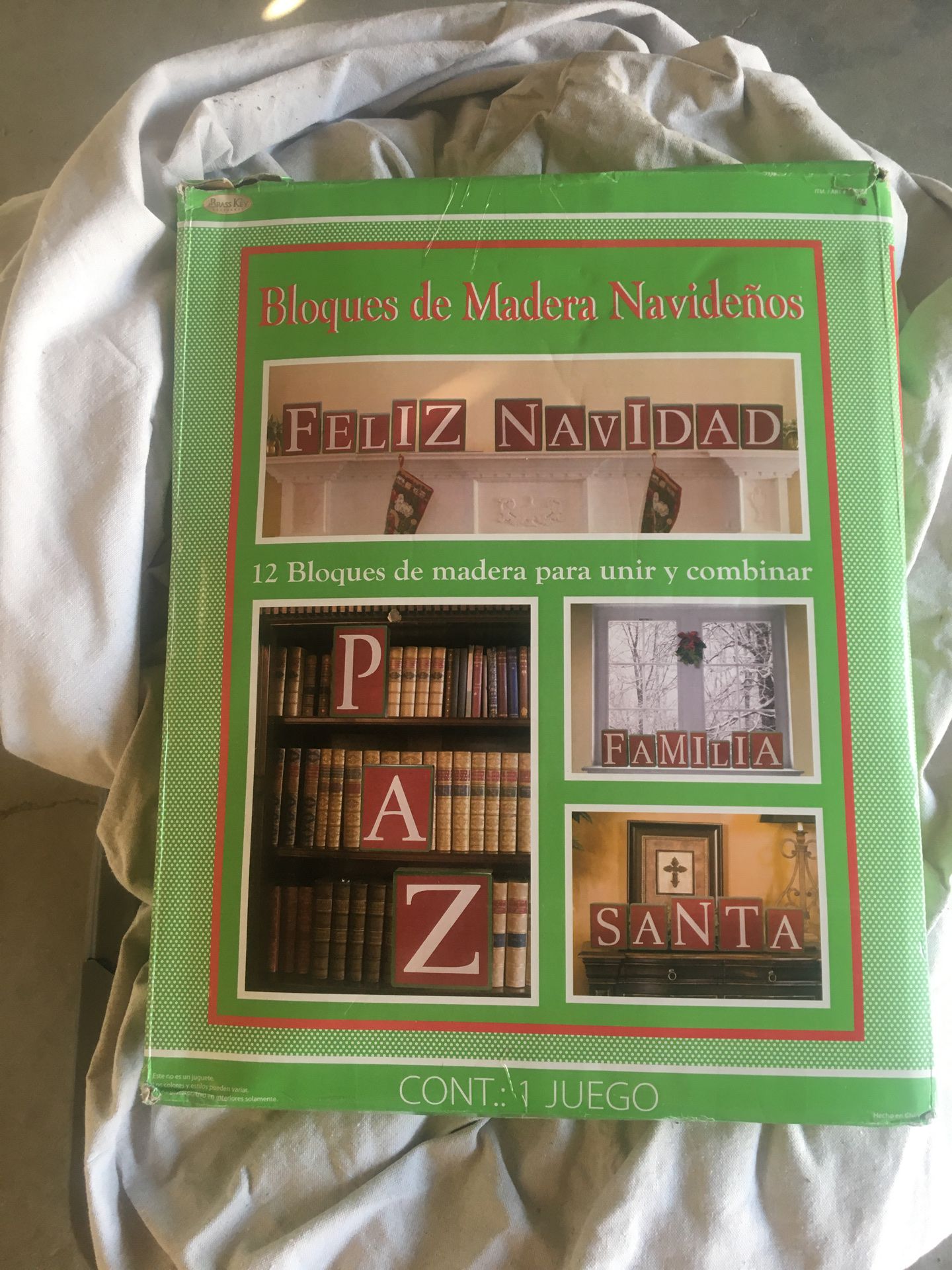 Christmas decoration, brand new in the box. 12 blocks assorted sizes that can spell out 12 words. Pictures show words and sizes.