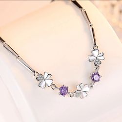 10K white gold purple similar diamond plated bracelet