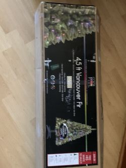 Artificial Christmas tree in original box lightly used