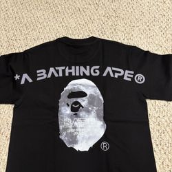 Never worn bape tee shirt double sided