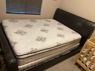 Queen bed with mattress and box spring