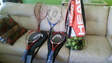 Four tennis rackets set,ball and bag two of the tennis rackets with bag