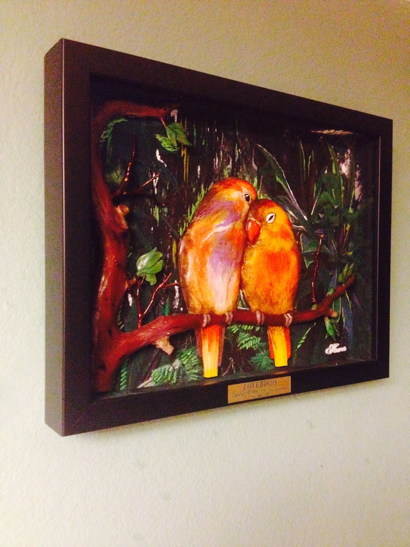 Very unique 1 of a kind 3-D effect beautiful hand sculpted and hand painted lovebirds. Set in a high quality frame with museum glass. Measures 17.5