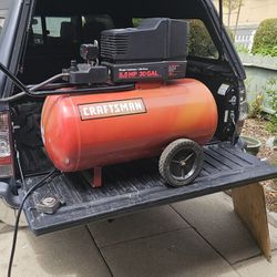 5.5HP Craftsman air compressor, Good condition, Comes with over a 100ft hose,