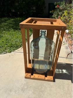 Vintage glass water bottle and record crate