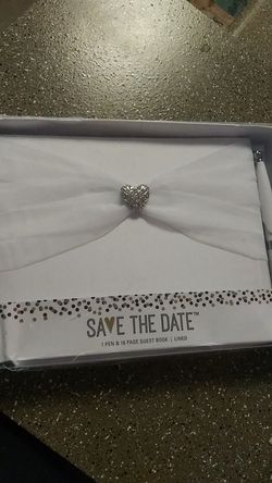 Wedding guest book with pen