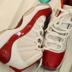 Cherry Red Jordan 11 Size 4y 100$