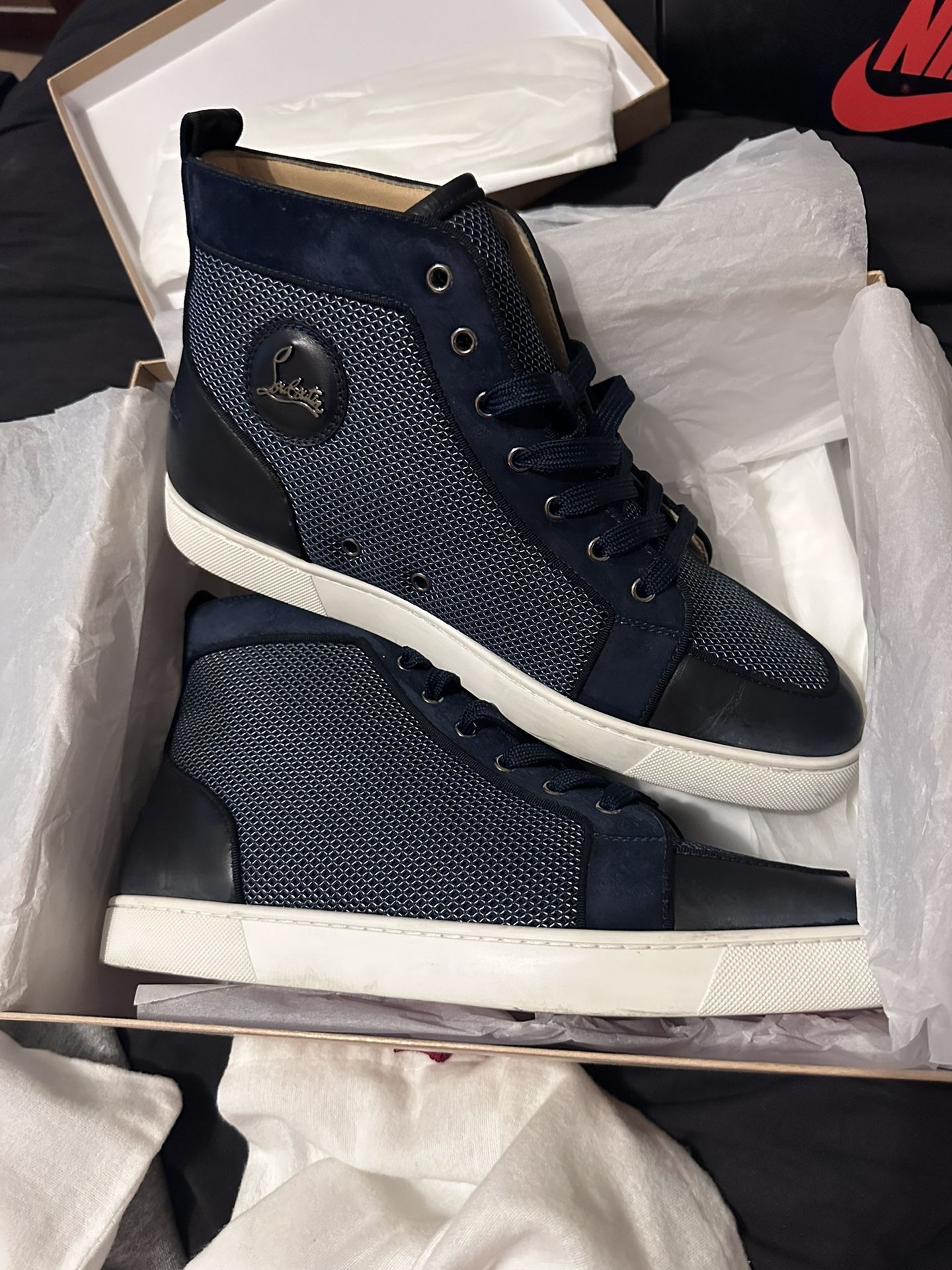 Blue Christian Louboutin ( red bottoms )