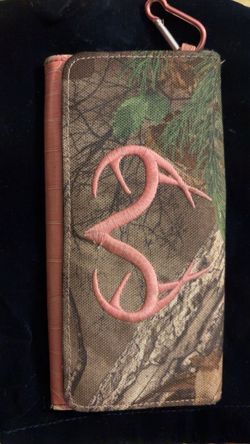 women's camouflage print wallet with pink embroidered antlers and a pink side/trim accent.