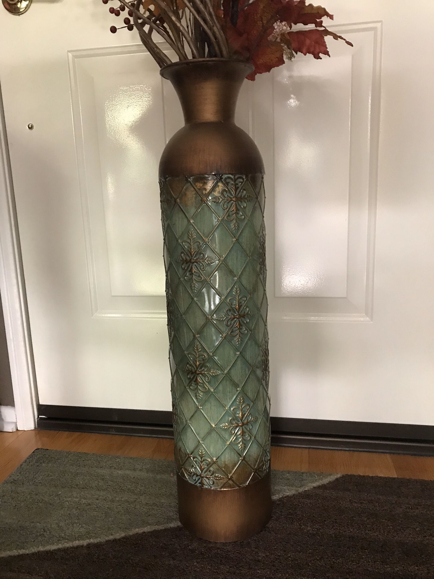 Tall Metal vase with twigs and fall foliage
