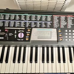 Casio CTK501 piano with stand