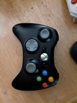 1 Xbox 360 wireless controller set with bay charger.