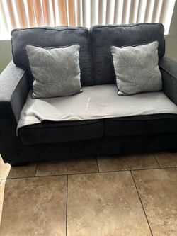 Loveseat and sofa bed set