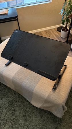 Height adjustable lap desk.