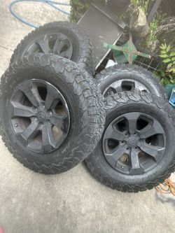 RAM REBEL RIMS AND TIRES