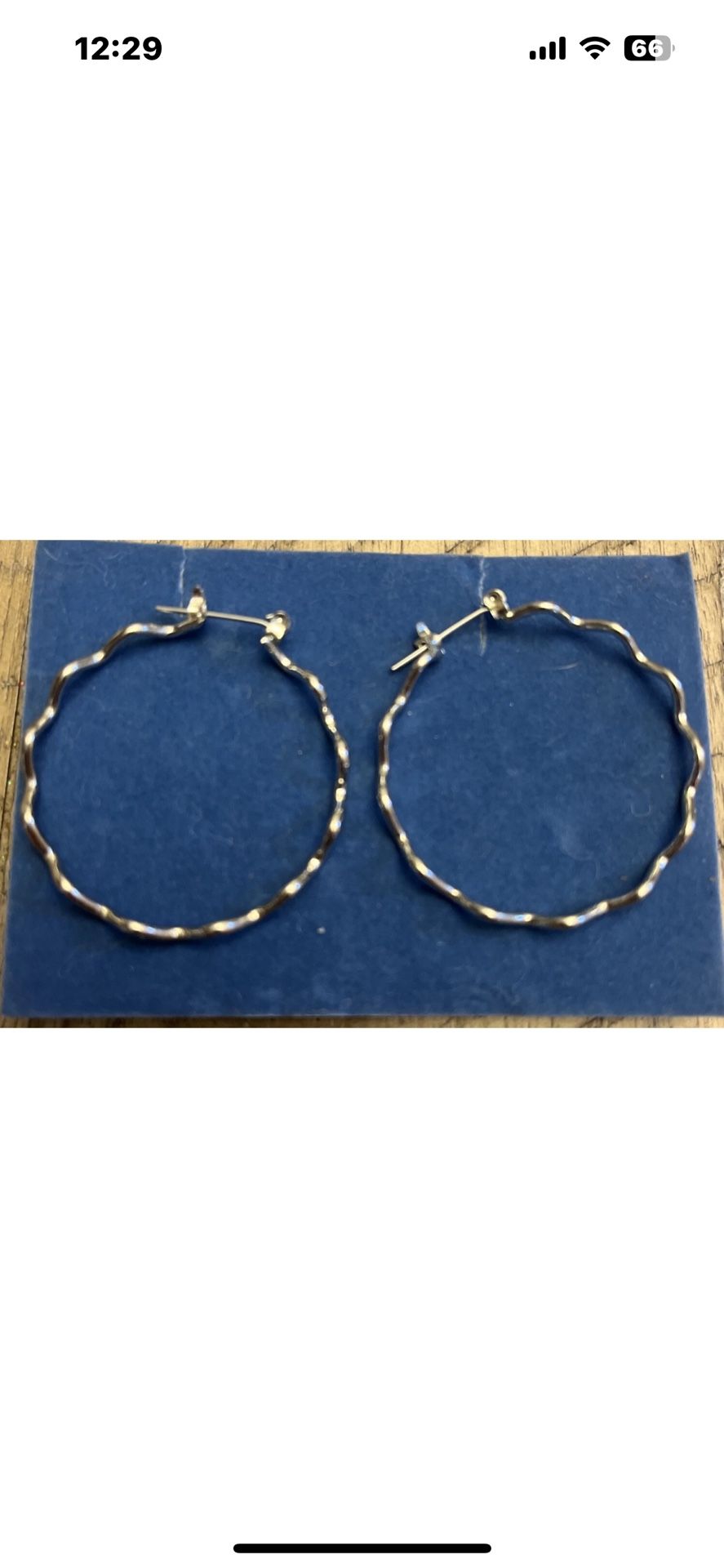 Silver Toned Hoops.